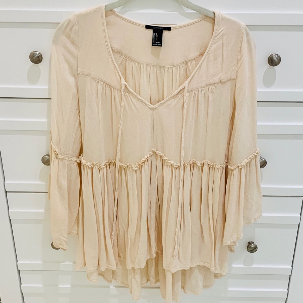 Blush hi-lo peasant top